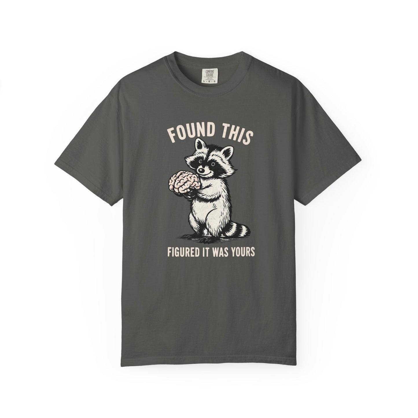 Found This Raccoon Holding Brain T-Shirt — "FOUND THIS / FIGURED IT WAS YOURS"