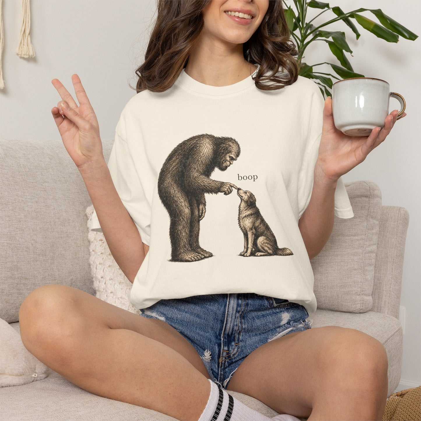 Bigfoot Booping Dog T-Shirt — Funny Sasquatch Tee for Dog Lovers