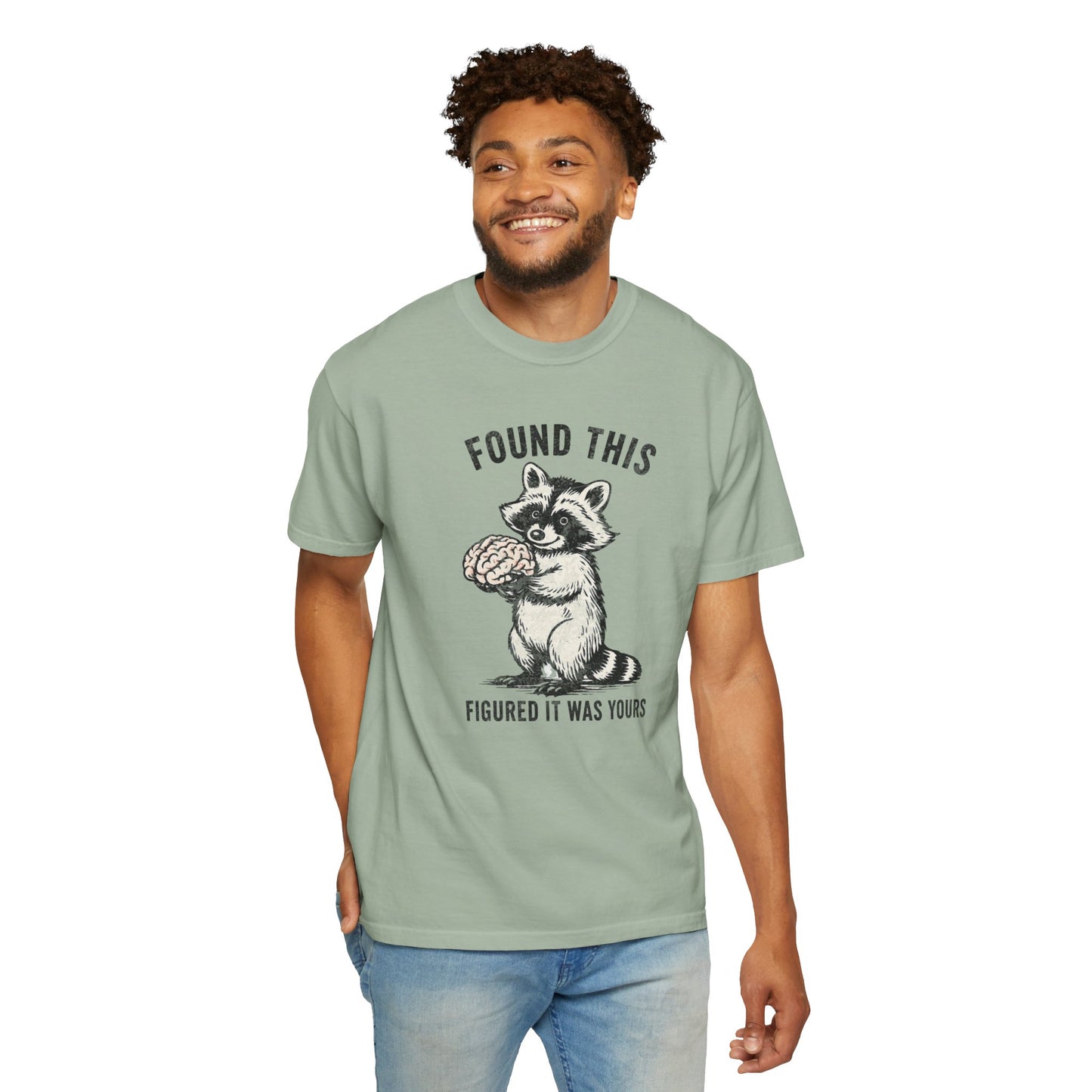 Found This Raccoon Holding Brain T-Shirt — "FOUND THIS / FIGURED IT WAS YOURS"