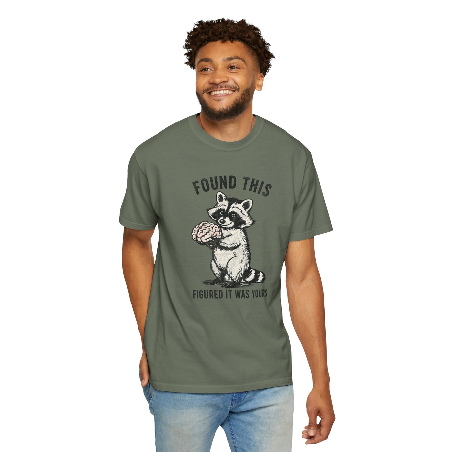 Found This Raccoon Holding Brain T-Shirt — "FOUND THIS / FIGURED IT WAS YOURS"