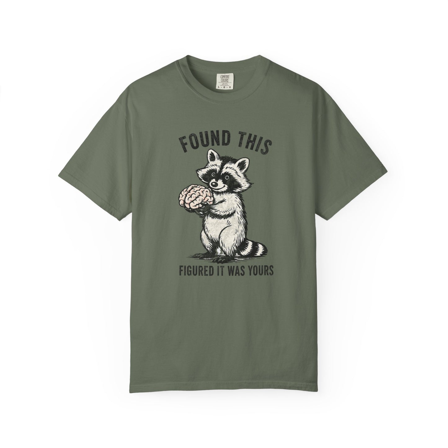 Found This Raccoon Holding Brain T-Shirt — "FOUND THIS / FIGURED IT WAS YOURS"
