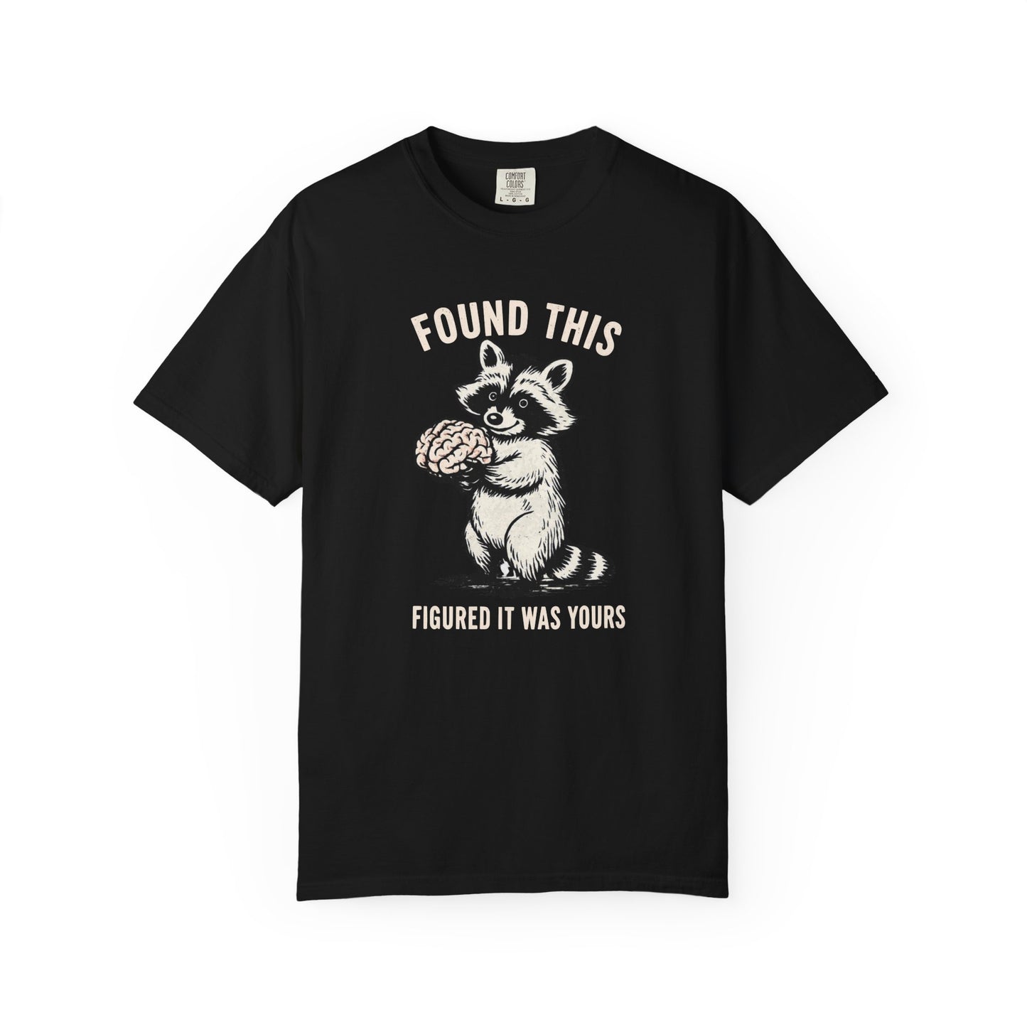 Found This Raccoon Holding Brain T-Shirt — "FOUND THIS / FIGURED IT WAS YOURS"