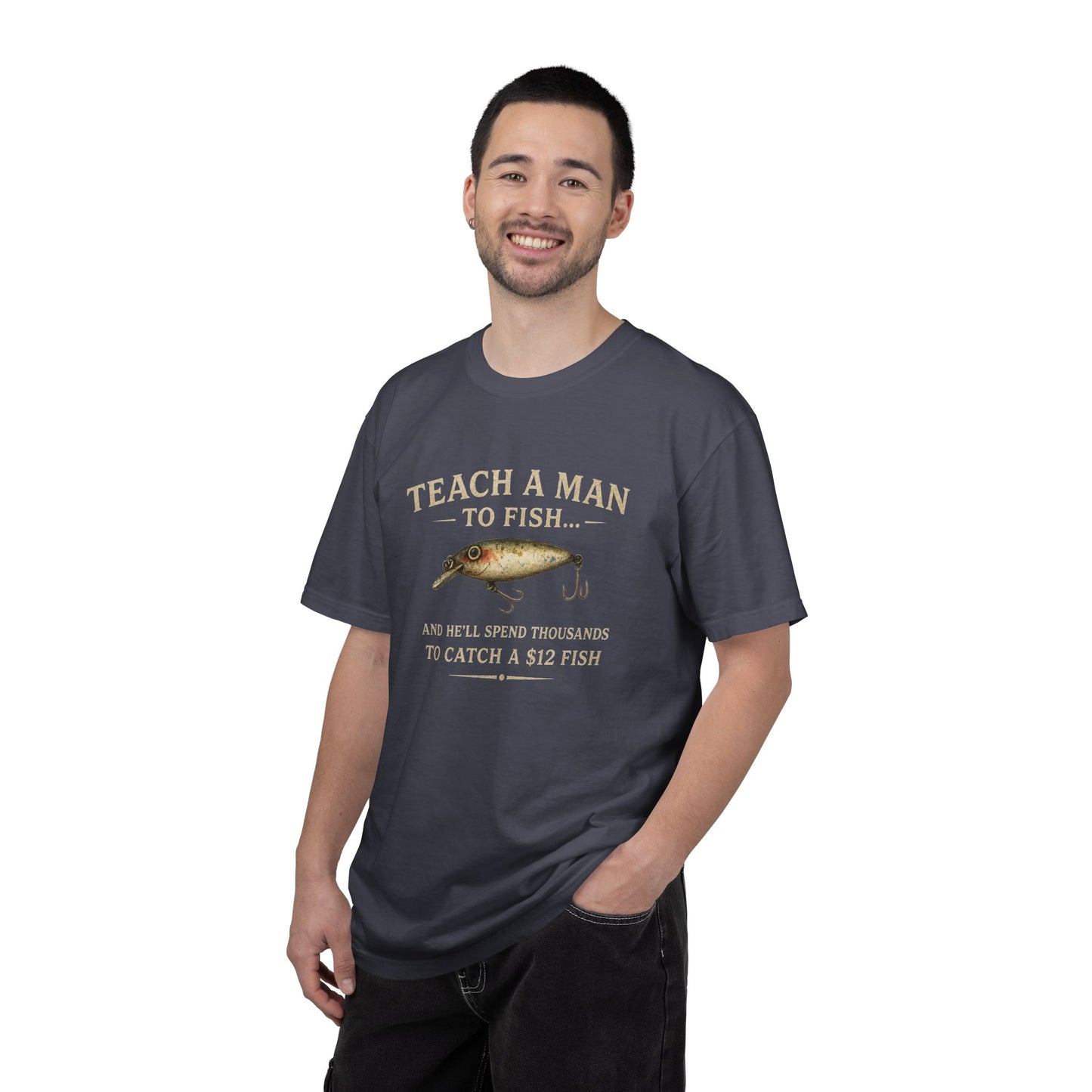 Fishing Humor T-Shirt — "Teach a Man to Fish...He'll Spend Thousands to Catch a 12 Fish"