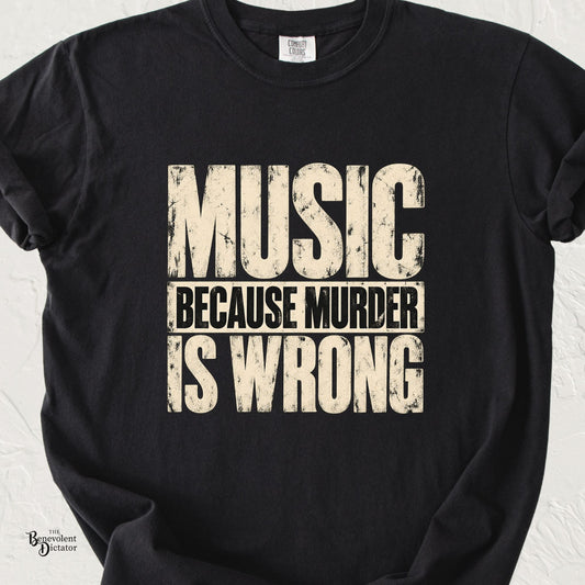 Black Comfort Colors t-shirt featuring distressed cream typography reading “Music Because Murder Is Wrong” in a bold vintage-style graphic design.