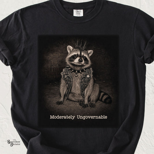 Black Comfort Colors t-shirt featuring a punk raccoon with a mohawk, spiked collar and denim vest with the phrase Moderately Ungovernable.
