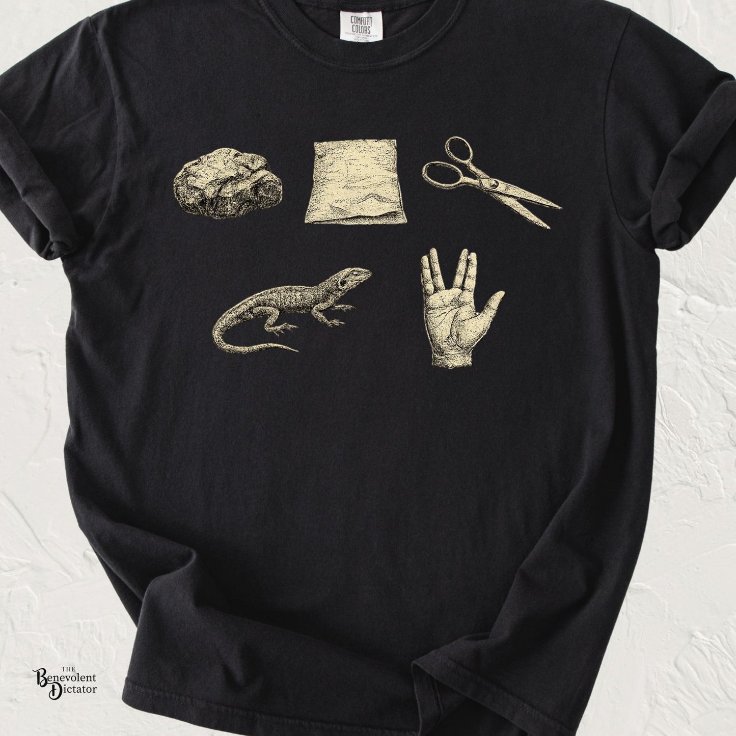Vintage Rock Paper Scissors Lizard Spock graphic t-shirt featuring illustrated rock, paper, scissors, lizard, and Vulcan salute hand symbols on a black shirt.