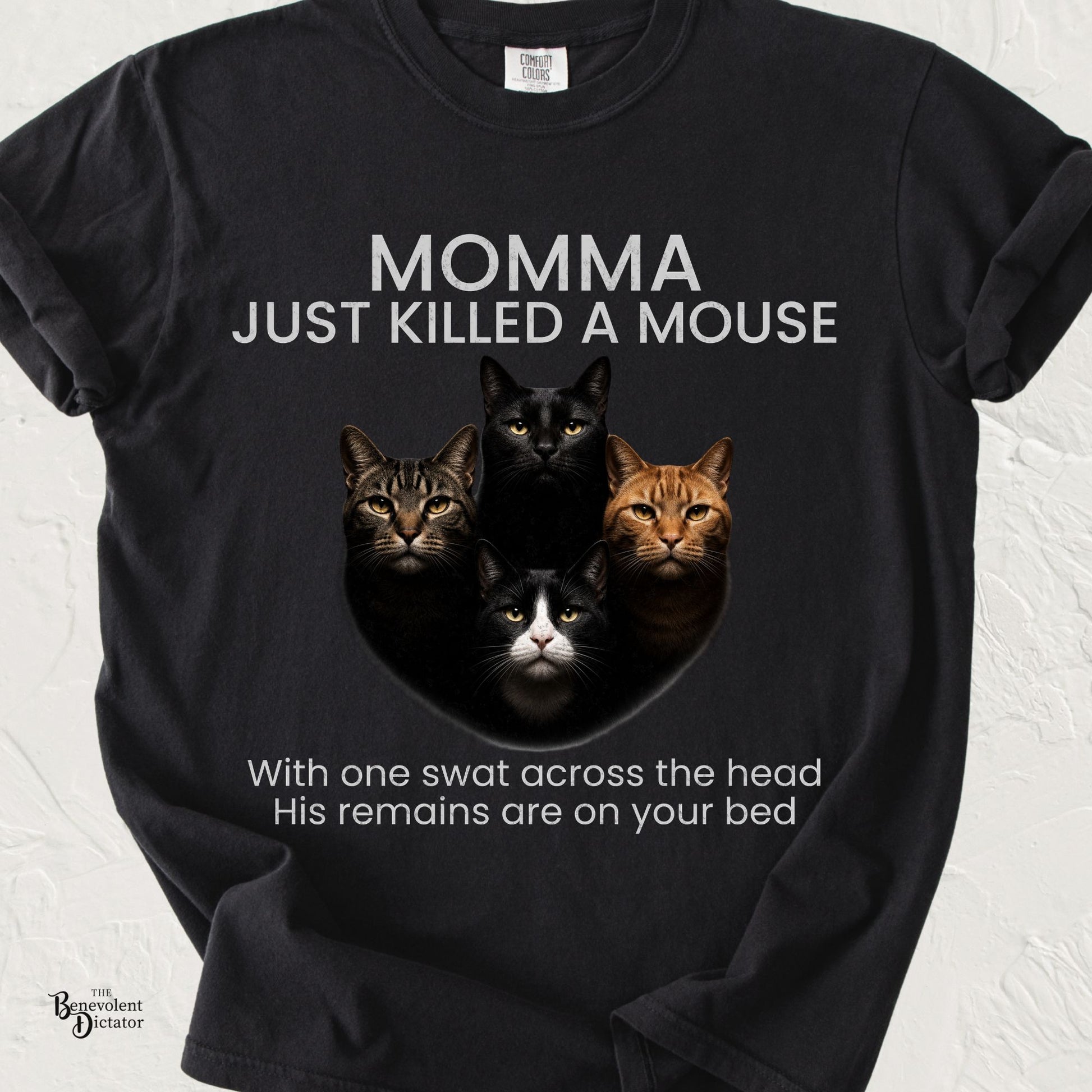 Comfort Colors black t-shirt inspired by the iconic Queen album cover featuring four serious cats and the parody text "Momma Just Killed a Mouse."