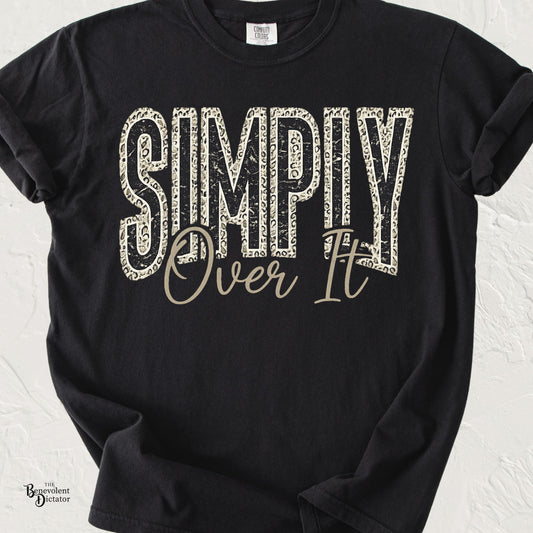 Vintage distressed typography reading "Simply Over It" with leopard print accents and script lettering on a Comfort Colors® t-shirt.