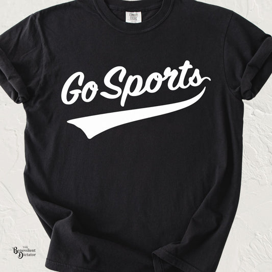 Minimalist typography t-shirt featuring the phrase "Go Sports" in vintage-inspired script with a swoosh underline on a Comfort Colors® tee.