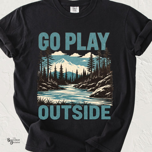 Vintage mountain landscape with river, pine forest, and bold blue typography reading "Go Play Outside" on a transparent background.