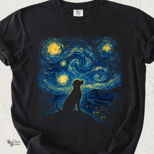 Art-inspired dog graphic t-shirt featuring a seated dog silhouette beneath a swirling blue and gold starry night sky.