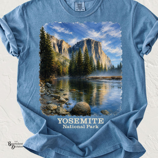 Vintage Yosemite National Park landscape featuring El Capitan, pine trees, and the Merced River on a Comfort Colors shirt.