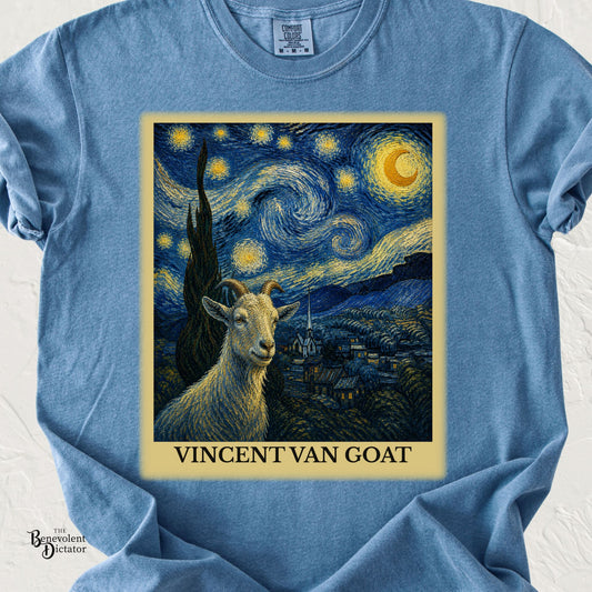 Blue Comfort Colors t-shirt featuring a goat in a Starry Night-inspired swirling night landscape with the humorous title “Vincent Van Goat.”