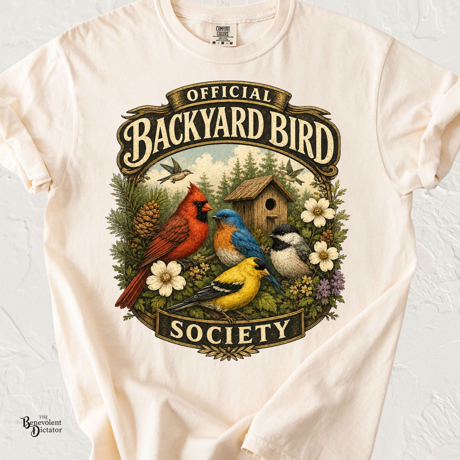 Vintage backyard bird watching graphic featuring a cardinal, bluebird, goldfinch, chickadee, birdhouse, and the words "Official Backyard Bird Society."