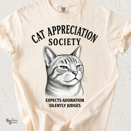 Cat Appreciation Society T-Shirt — “Expects Adoration, Silently Judges”