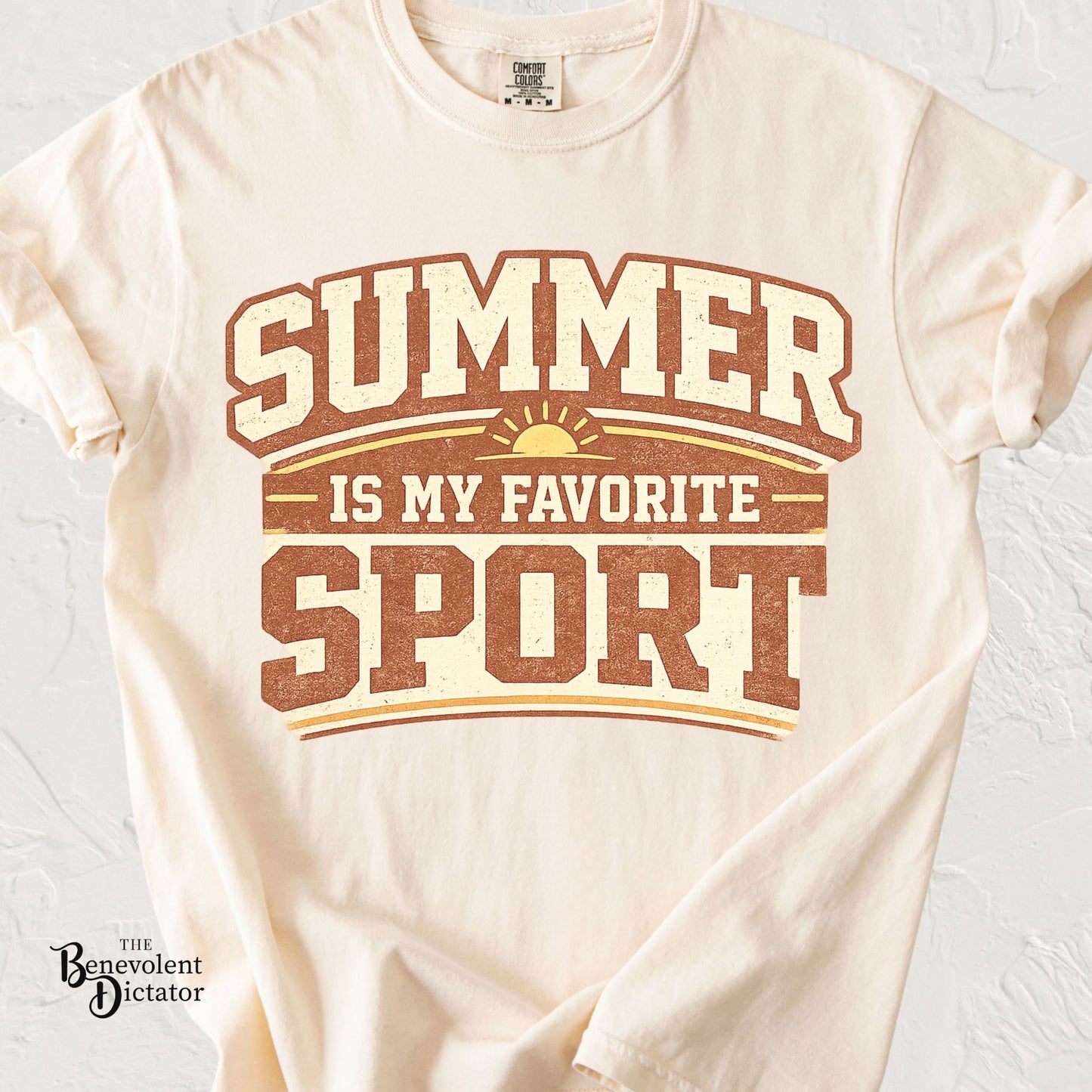 Vintage typography t-shirt featuring the phrase Summer Is My Favorite Sport with retro sunset graphic.