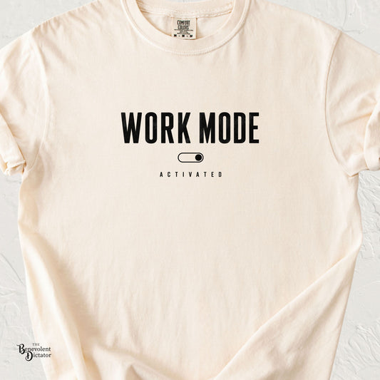 Ivory Comfort Colors t-shirt with minimalist black typography reading “Work Mode Activated” and a simple toggle switch graphic.
