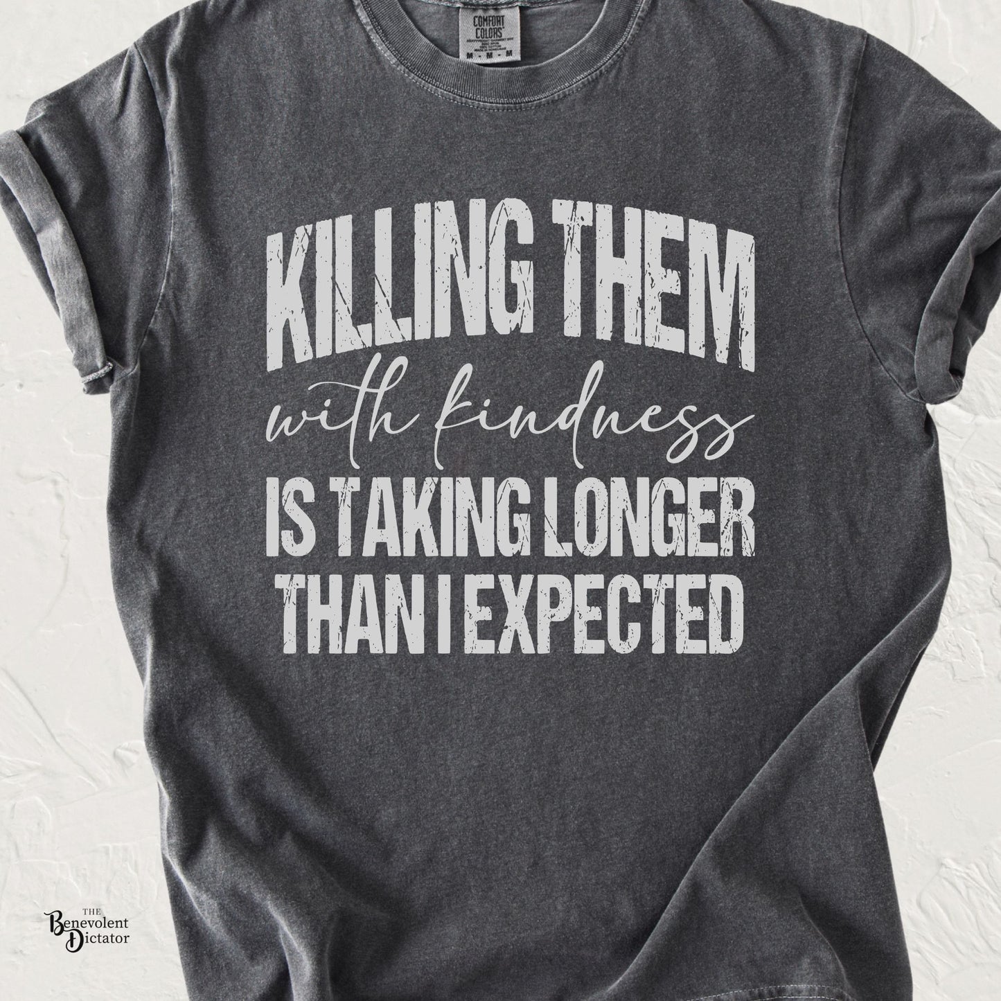 Pepper Comfort Colors t-shirt featuring distressed white typography that reads "Killing Them with Kindness Is Taking Longer Than I Expected."