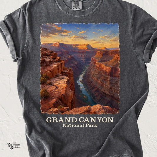 Vintage Grand Canyon National Park landscape featuring the Colorado River winding through dramatic canyon cliffs at sunset on a Comfort Colors shirt.