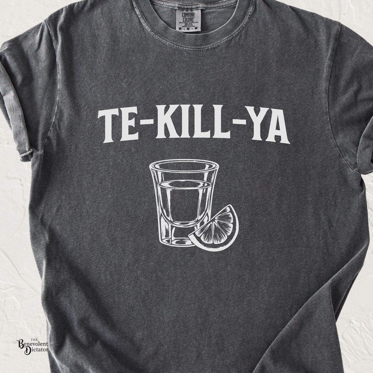 Pepper Comfort Colors t-shirt featuring a vintage white illustration of a tequila shot glass with a lime wedge and the words “Te-Kill-Ya.”