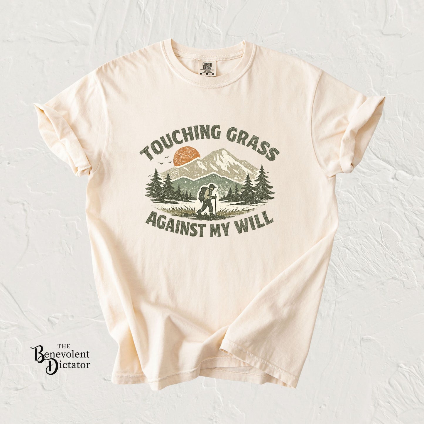 anti hustle t-shirt with nature-themed graphic and text on a light gray background