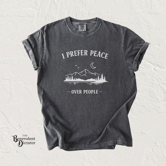 Black t-shirt with 'I Prefer Peace Over People' graphic on a textured white background