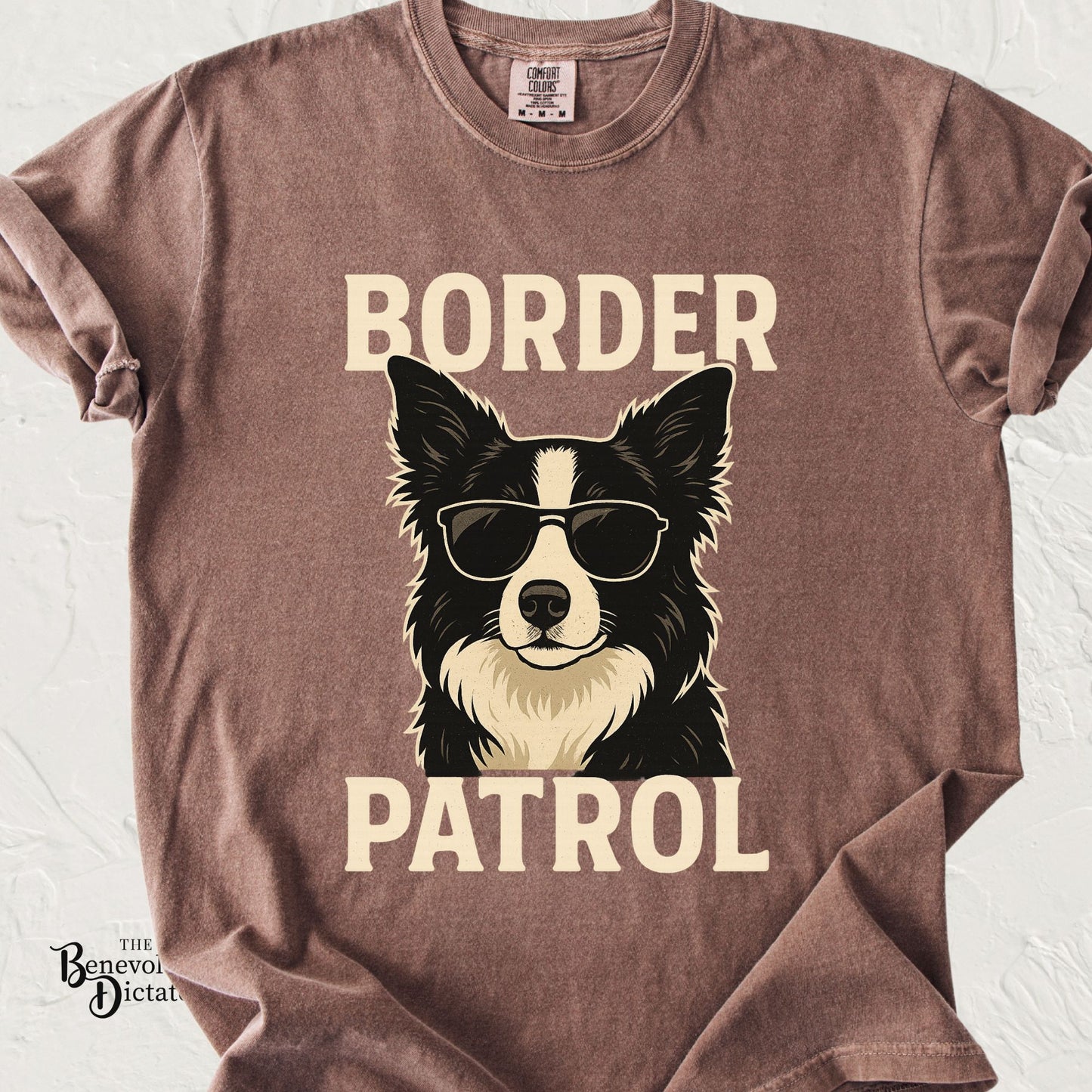 Comfort Colors espresso brown t-shirt featuring a cool Border Collie wearing aviator sunglasses with bold cream text reading "Border Patrol."