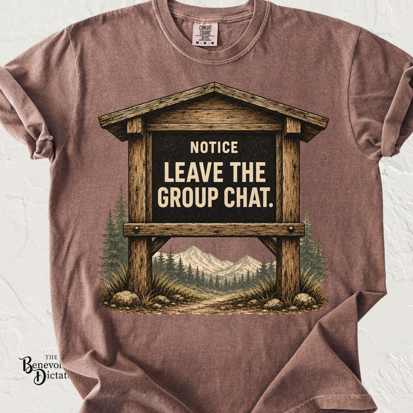 Vintage national park trailhead sign featuring the phrase "Notice: Leave the Group Chat" with mountains and pine trees on a Comfort Colors® t-shirt.